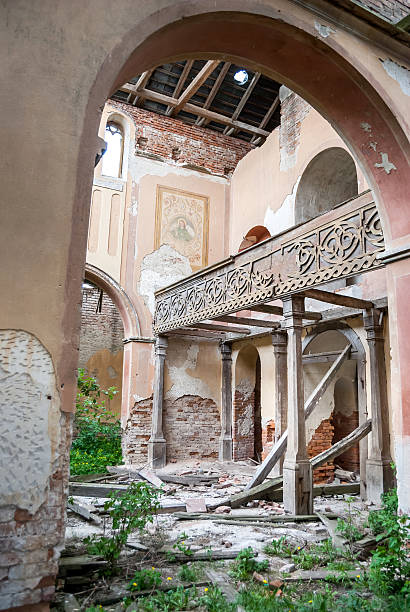 istock inside of ruined brick Catholic church 582302348