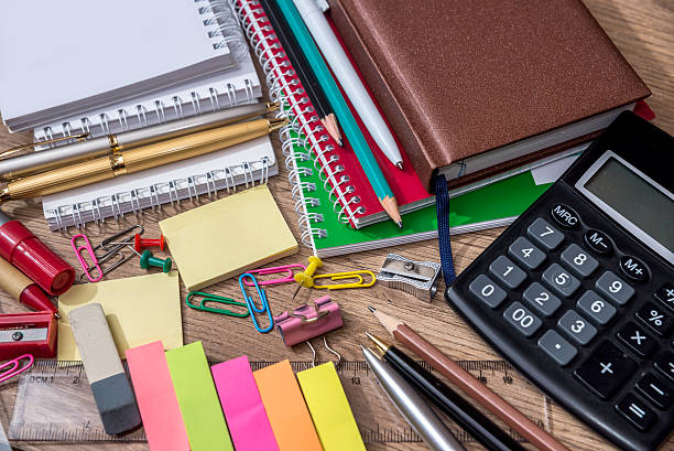 istock many school supplies on wooden background 582302802