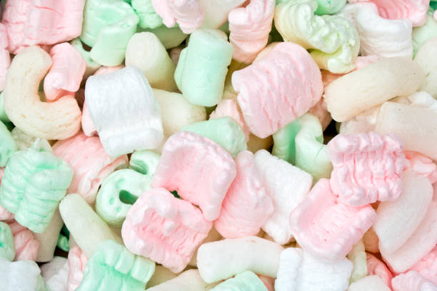 istock Pink, White and Green Packing Peanut Foam 582302952