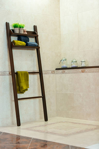istock Wooden stand with towels in bathroom 582304770