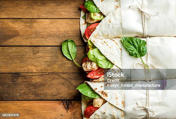 Healthy Lunch Snack Tortilla Wraps With Grilled Chicken Fillet And Stock Photo - Download Image Now
