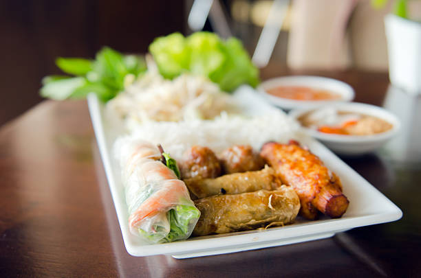 istock Spring roll with pork, fried shrimp with sugar cane 582306600