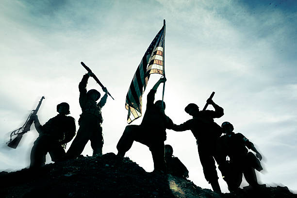 istock Soldiers with American flag. 582309520