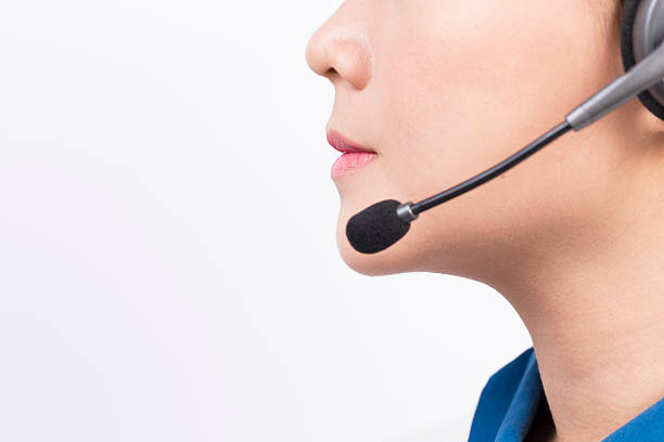 istock Operator or businesswoman in headset 582310286