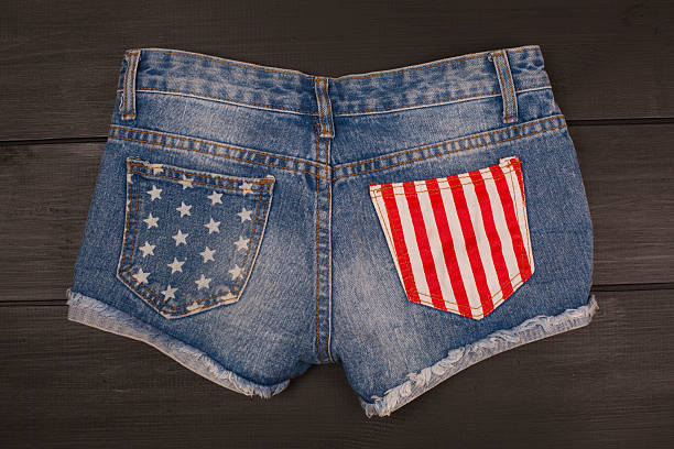 istock Jeans shorts in wood background 582310624