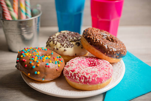 istock Four seasons of donuts 582310820