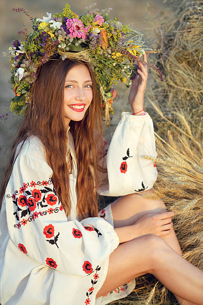 istock Beautiful smiling girl in meadow 582312478