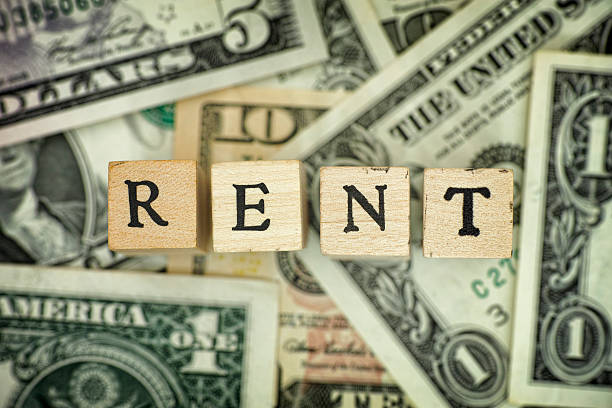 istock Word RENT on dollar bills 582313074