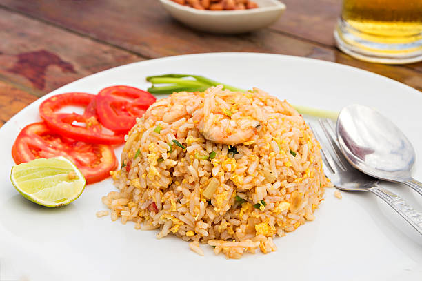 istock Fried rice with shrimp and side dishes 582313936