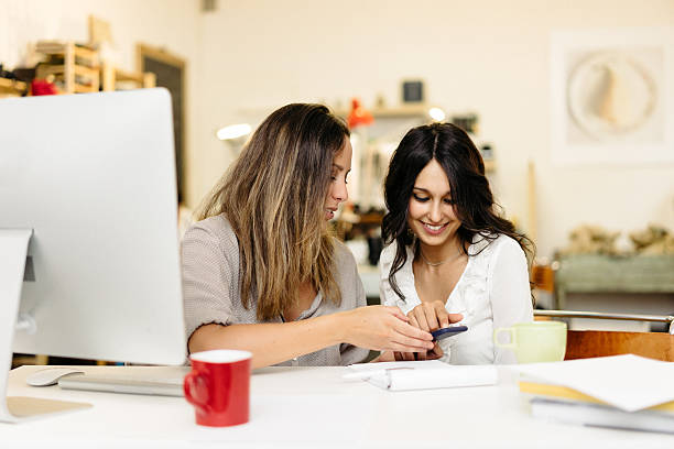 istock Beautiful Young Women Working Together In A Startup 582315344