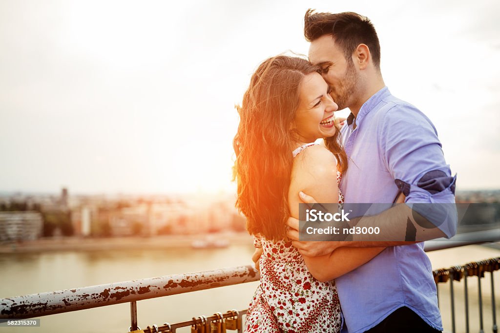 Couple in love hugging Couple in love hugging outdoors and sharing true emotions Adult Stock Photo