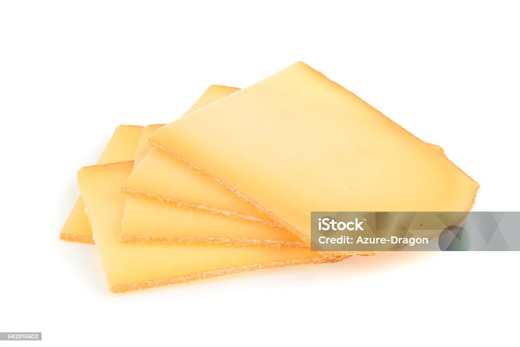 Raclette cheese isolated on white background Raclette Stock Photo