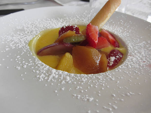 istock Zabaglione cream with fresh fruit and rolled wafer 583689480