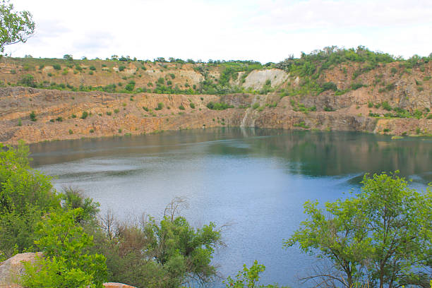 istock Lake at abandoned quarry 583694546