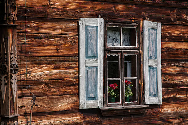 istock Windows on old wooden house 583694734