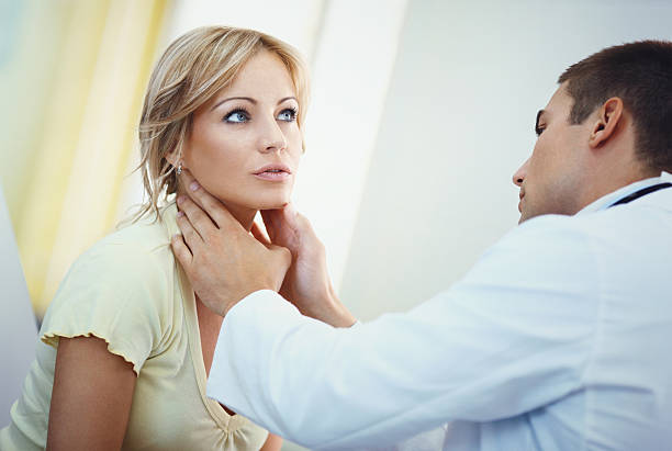 istock Woman visiting a doctor. 583695350