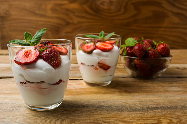 istock Strawberries cream cheese dessert on wooden background 583696472