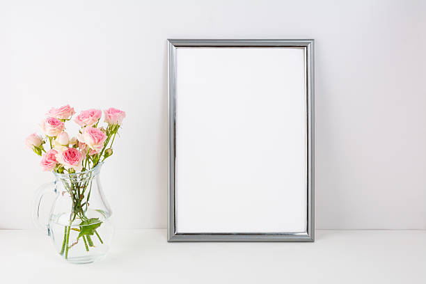 silver frame mockup with pink roses - fotografia imagem imagens e fotografias de stock