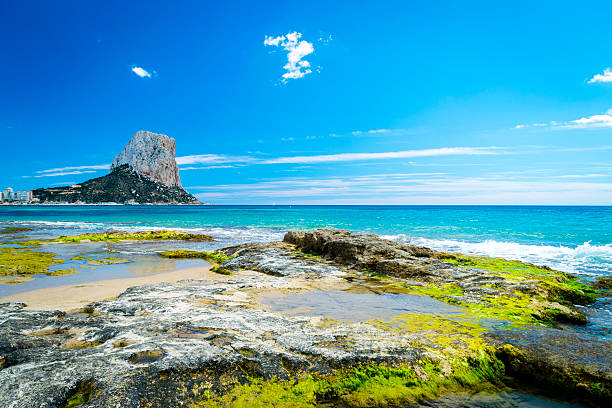 Penyal d'Ifac with the surf breaking over the rocks