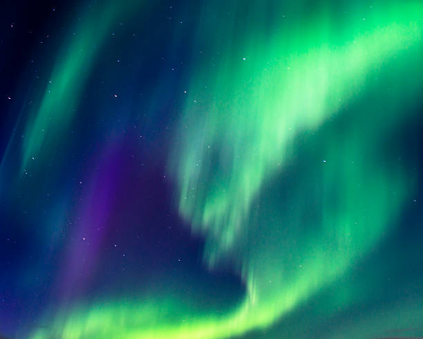 istock Bright green Northern lights (Aurora borealis) 583697322