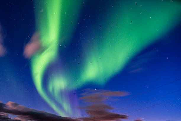 istock Bright green Northern lights (Aurora borealis) 583697370