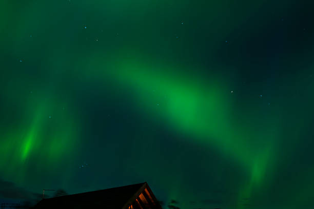 istock Bright green Northern lights (Aurora borealis) 583697504