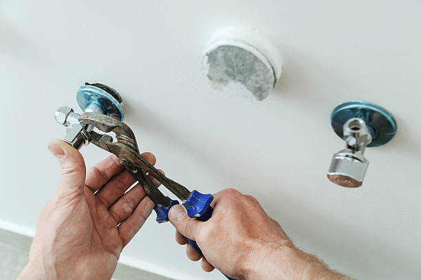 istock Plumber installs angel valve. 583698192