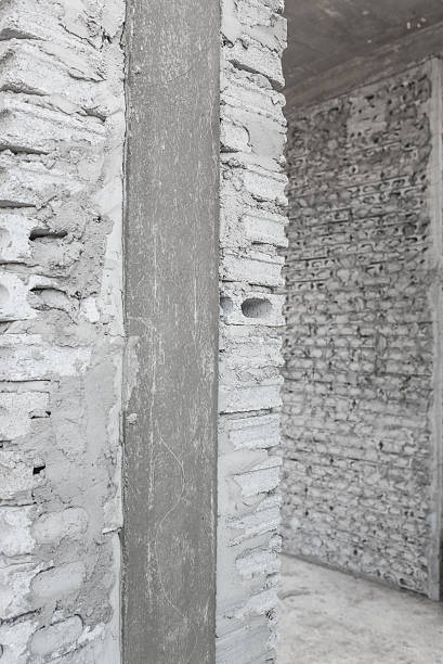 uncompleted grey concrete brick wall uncompleted architectural detail grey concrete brick wall under constuction uncompleted stock pictures, royalty-free photos & images