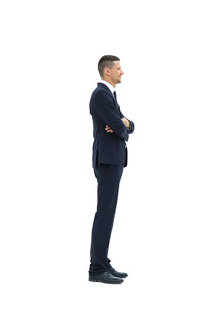 istock Side view of a smiling businessman, 583704414