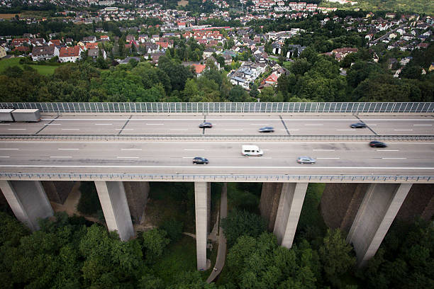 istock Highway bridge, passing cars, minor motion blur 583705726
