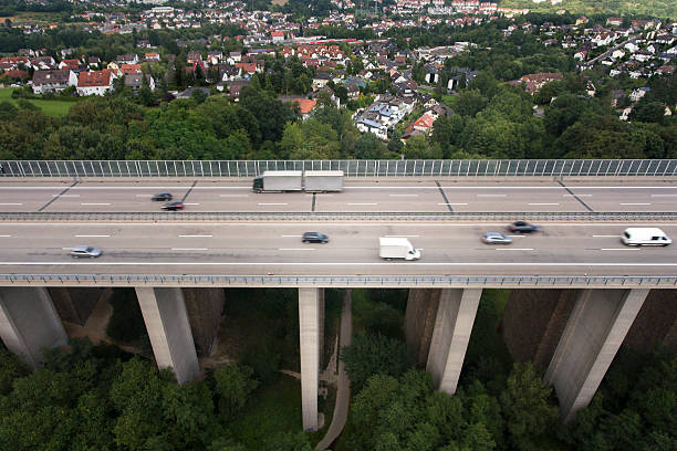 istock Highway bridge, passing cars, minor motion blur 583705744