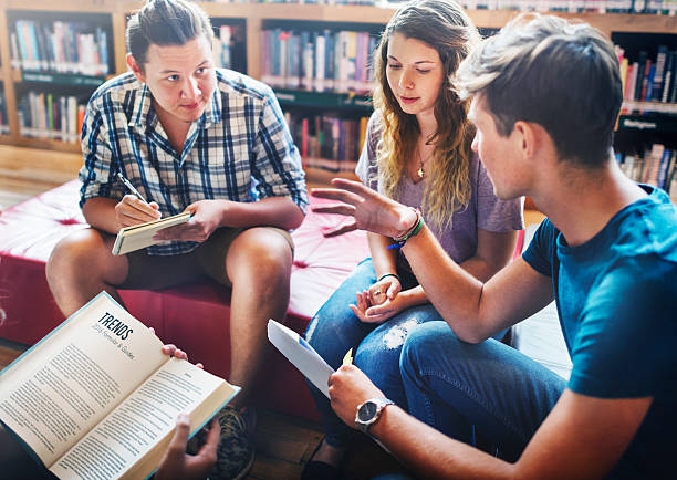 istock Classmate Classroom Sharing International Friend Concept 583706234