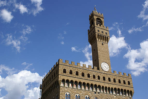 istock Palazzo Vecchio Clock Tower against Blue Sky, Florence, Tuscany, Italy 583707970