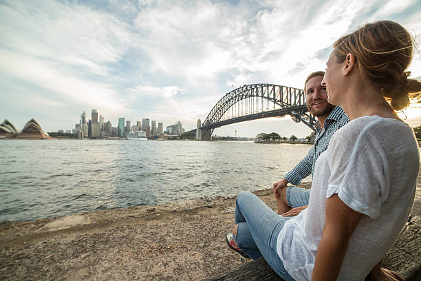 istock Caucasian couple chating in Sydney at sunset 583709722