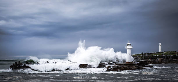 istock Huge Waves crashing on the breakwater 583710944