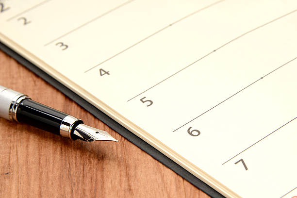 istock Business concept, personal organizer and fountain pen 583711274