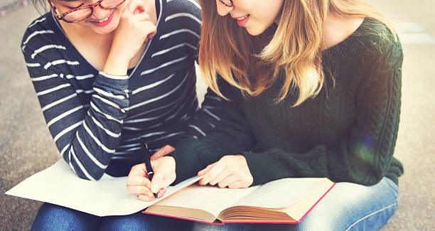 istock Women Talking Friendship Studying Brainstorming Concept 583712226