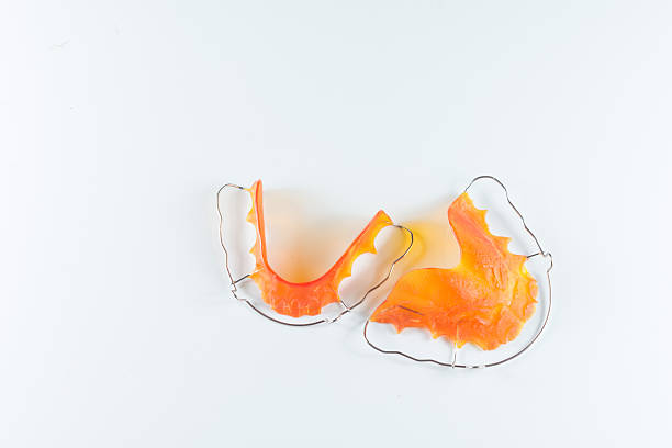 istock retainer after orthodontic equipment with shadows 583712734