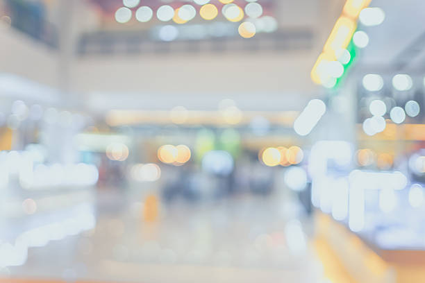 istock Blurred background, people shopping at department store with bok 583712946