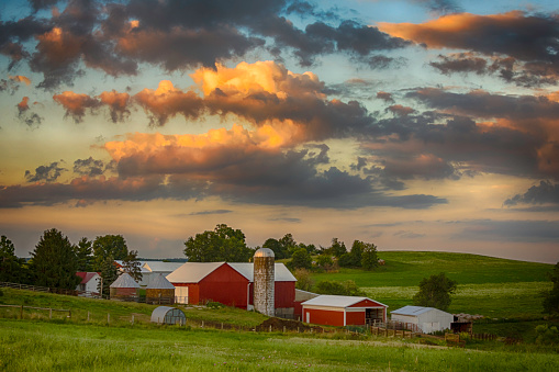 Sunset on a traditional dairy farm in rural Ohio in July