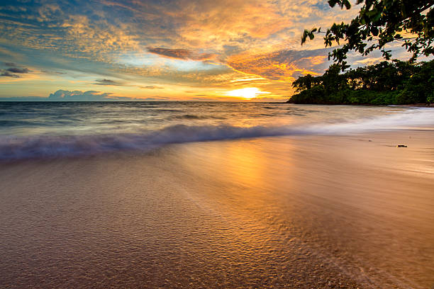 istock Wave hit the rock the twilight in the sea. 583714816