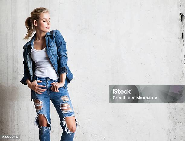 Attractive Woman In Jeans With Blond Hair Stock Photo - Download Image Now  - Jeans, Denim, Fashion - iStock