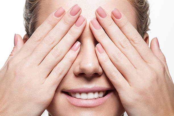 Woman with beautiful natural manicure and perfect clean skin Woman with beautiful natural manicure and perfect clean skin on white background caucasian human face women freshness stock pictures, royalty-free photos & images