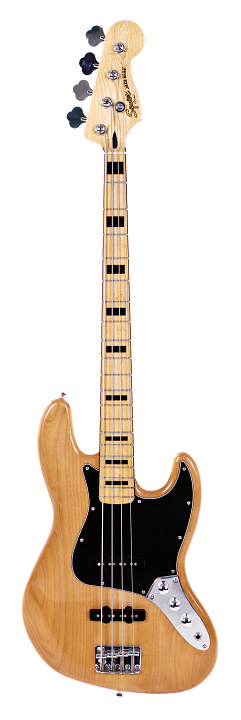 Cape Town, South Africa - July 2, 2016:  A Jazz Bass guitar from Fender's lower-priced Squier line. This instrument, made in 2013, is from Squier's Vintage Modified series, a well-received collection of traditional Fender models modified with certain modern features, produced in Indonesia.