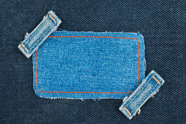istock Frame, tag, price  with two straps jeans, lies on the 583723878