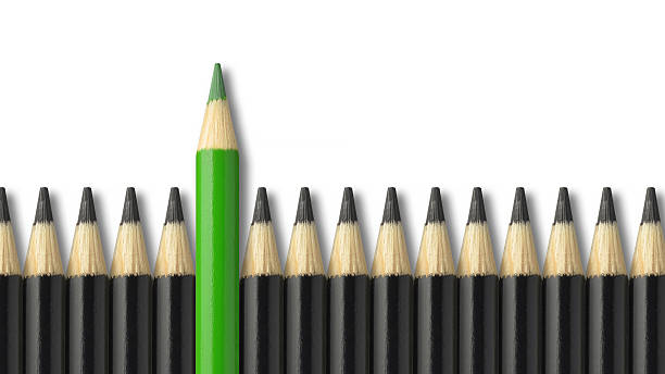 pencils Green pencil standing out from crowd of black pencils chief leader photos stock pictures, royalty-free photos & images