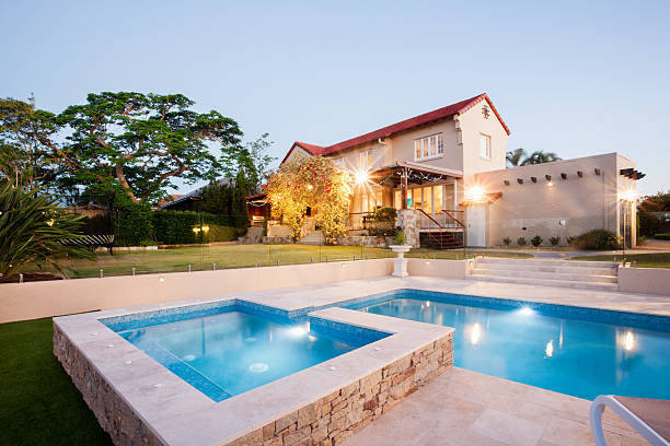 istock Luxury house garden decoration with a pool side 583726552