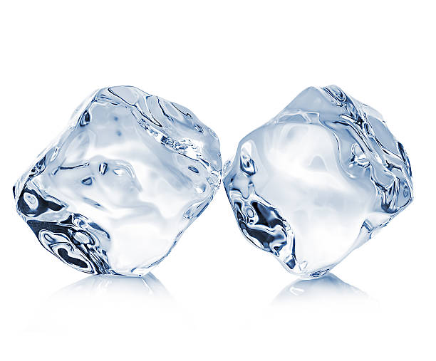 istock Two ice cubes close-up isolated on white. Clipping pats. 583728068