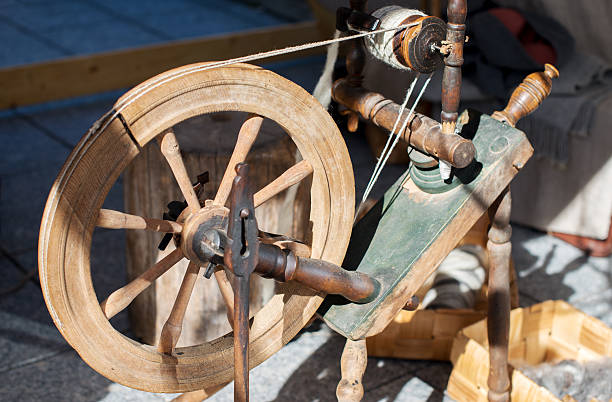 istock Old wooden distaff on the street. 583731426