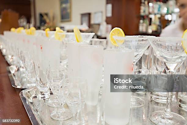 Empty Glasses In Restaurant Ready To Served With Liquid Stock Photo - Download Image Now
